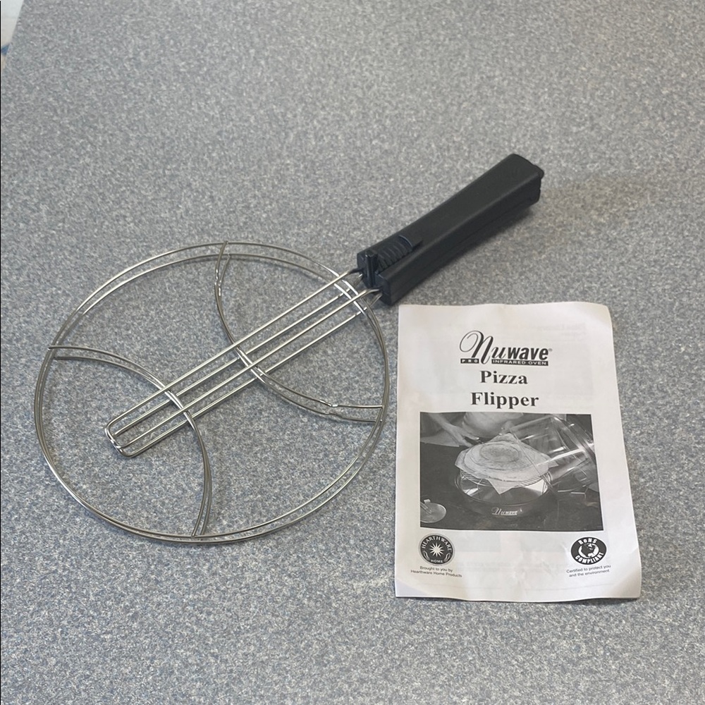 Silver and Black Pizza Flipper Kitchen Tool